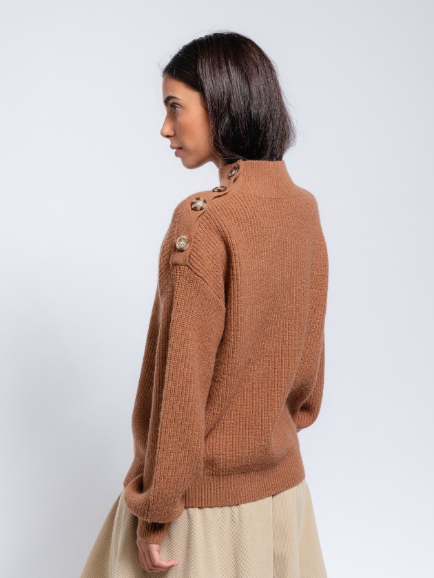 Knit sweater with button on the shoulder