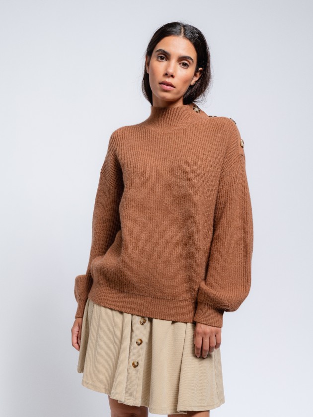 Knit sweater with button on the shoulder