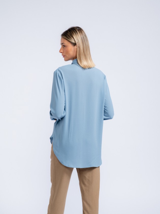 Blouse with pleats