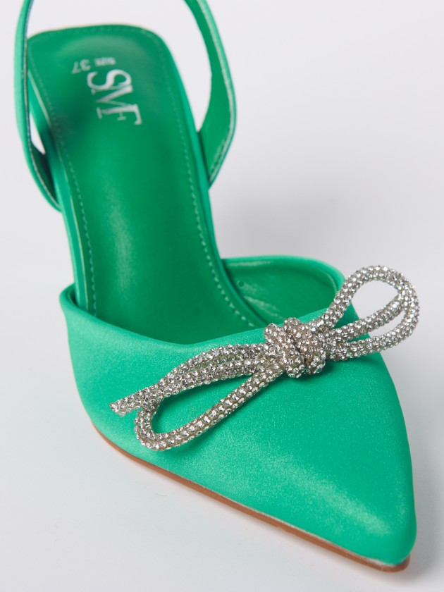 Heeled sandals with bow and sparkles