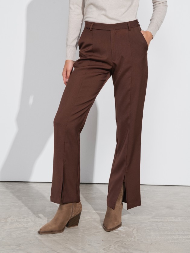 High-waisted trousers with opens at the front