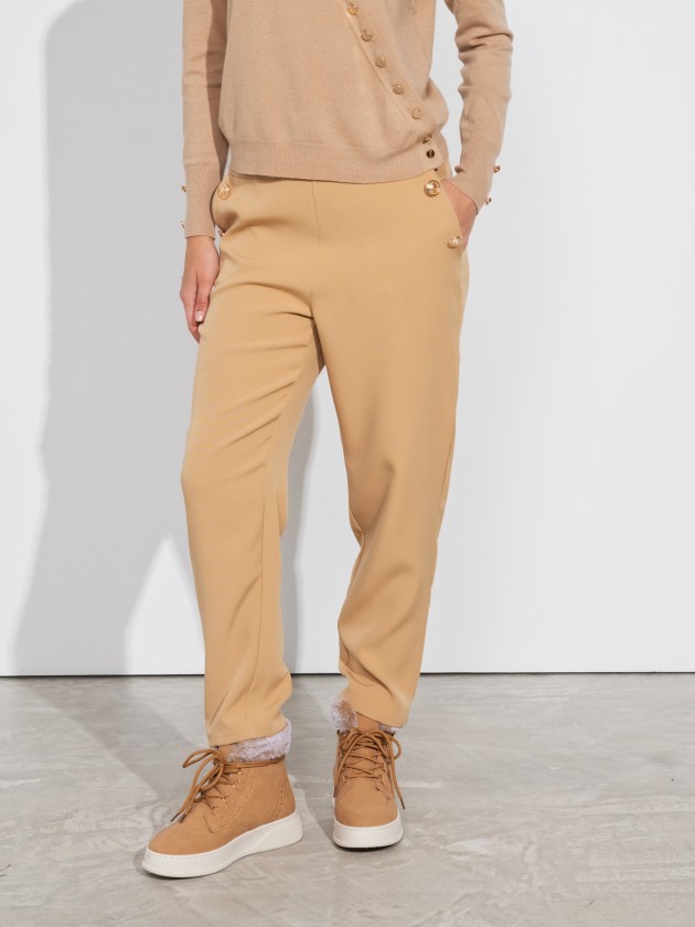 Trousers with button details