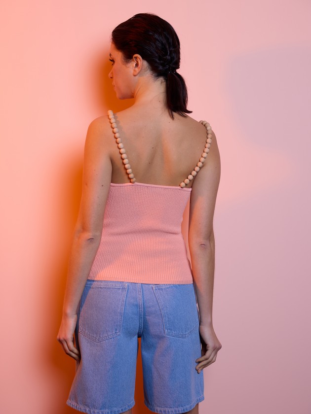 Knitted top with wooden straps
