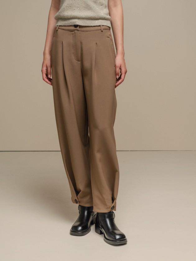 Trousers with button closure