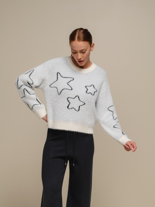 Pull en maille avec toiles