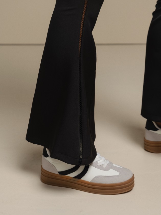 Bell-bottom trousers with embroidered details