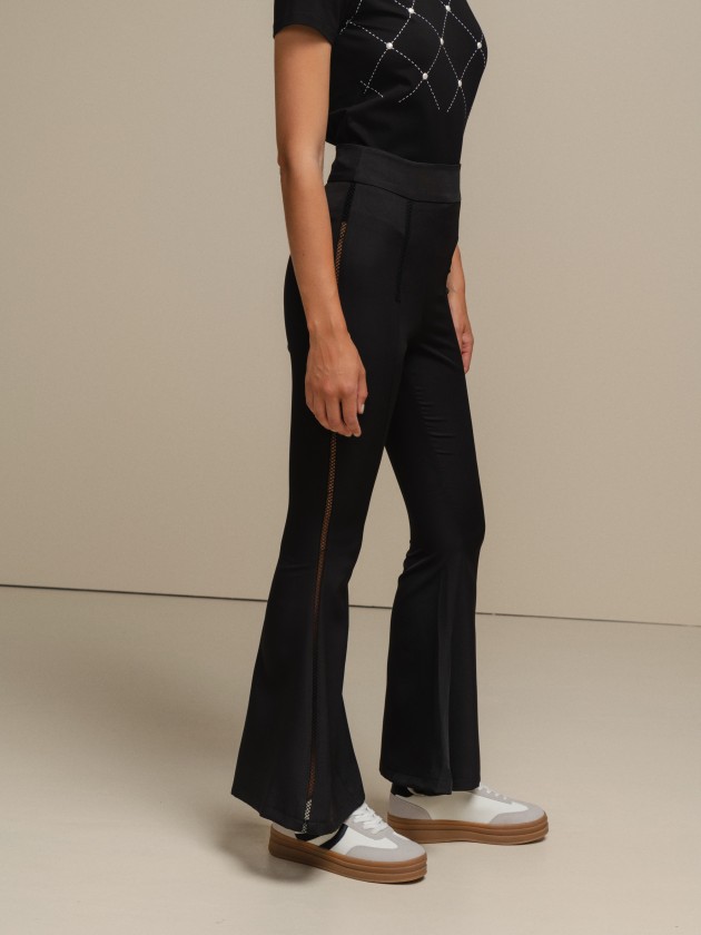 Bell-bottom trousers with embroidered details