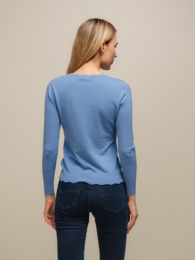 Round neck sweater with gold buttons on the sleeves