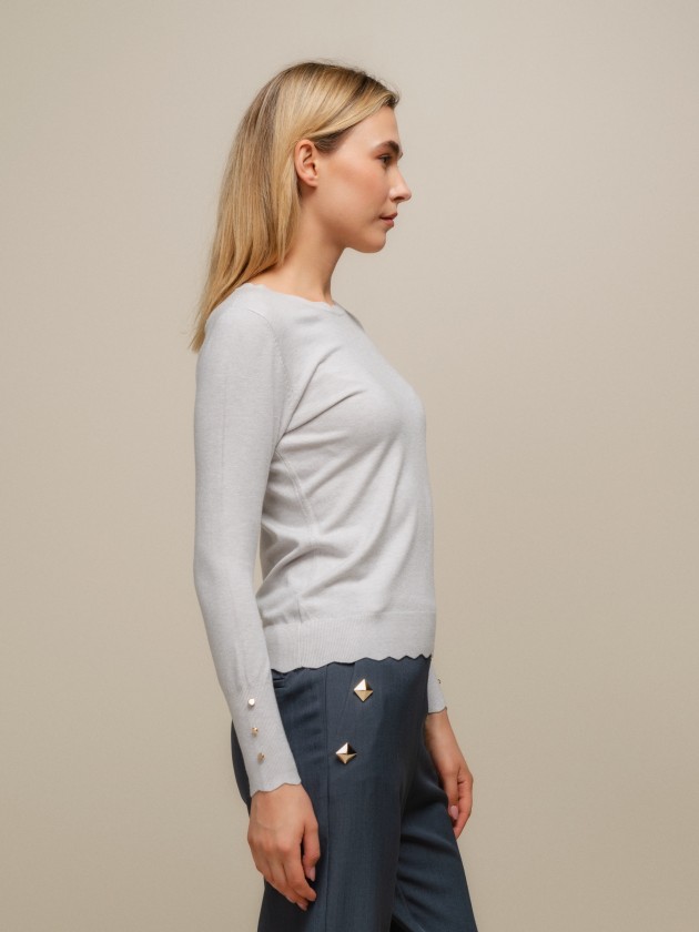 Round neck sweater with gold buttons on the sleeves