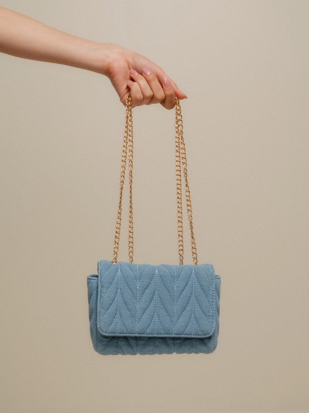 Denim bag with golden chains