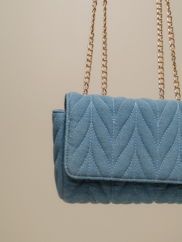 Denim bag with golden chains