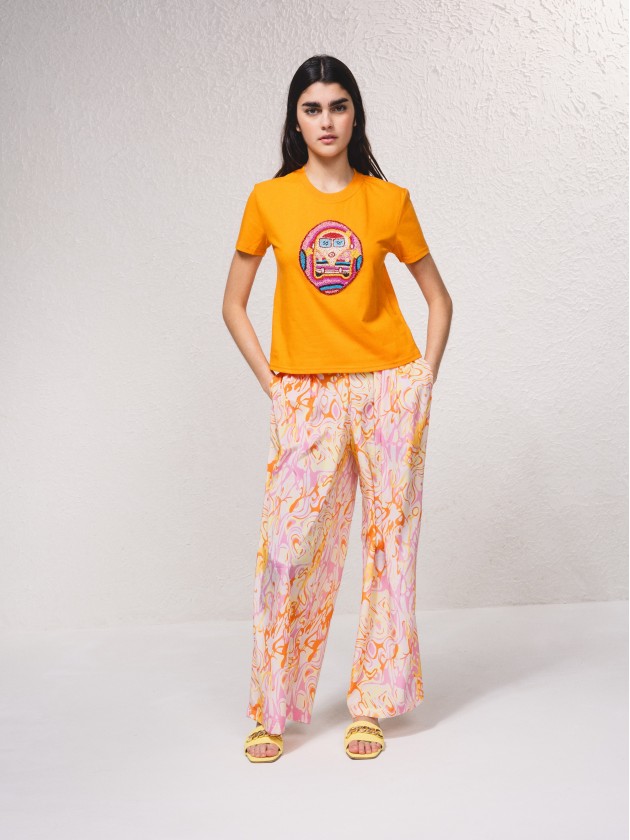 T-shirt com miangas