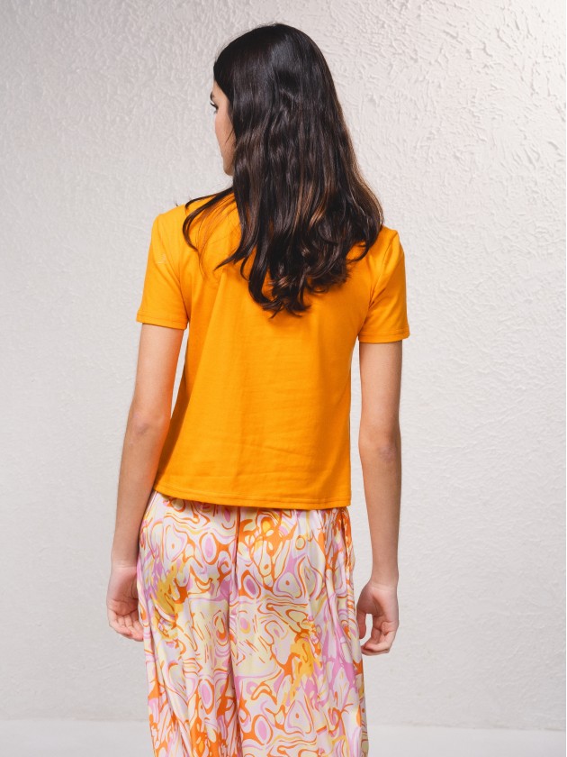 T-shirt com miangas