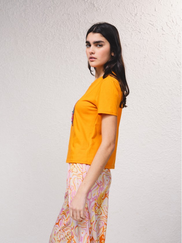 T-shirt com miangas