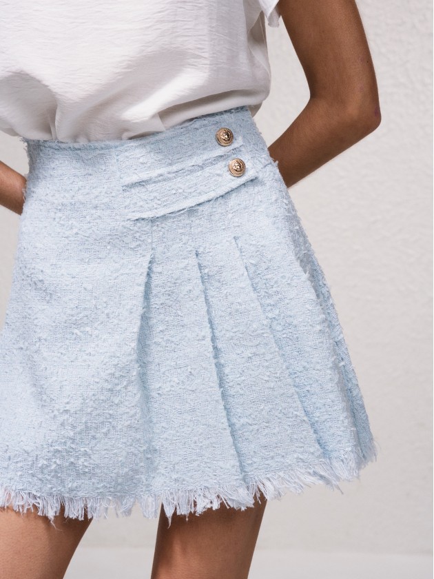 Jupe courte avec boutons dors