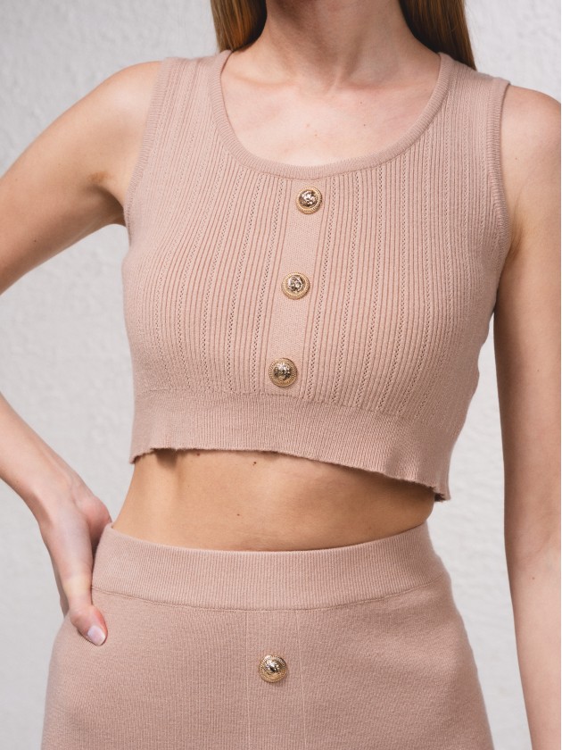 Top court en maille avec boutons