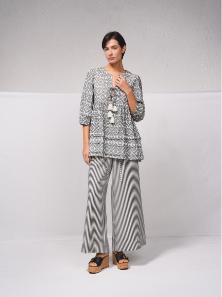 Tunic with ruffles and ties
