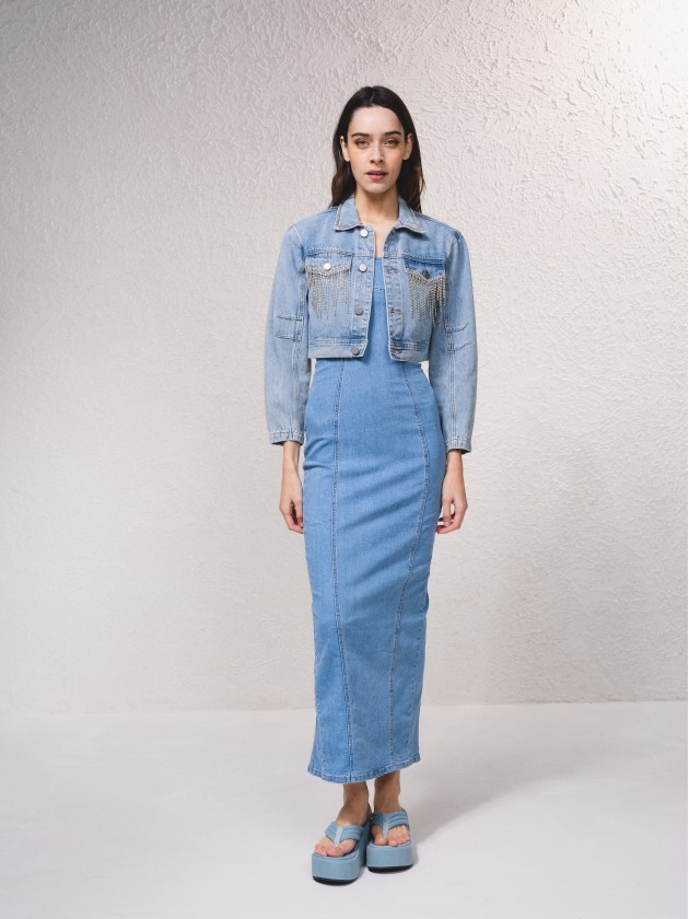 Denim jacket with applications on the pockets