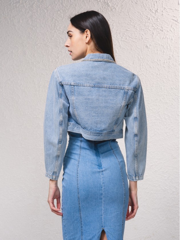 Denim jacket with applications on the pockets