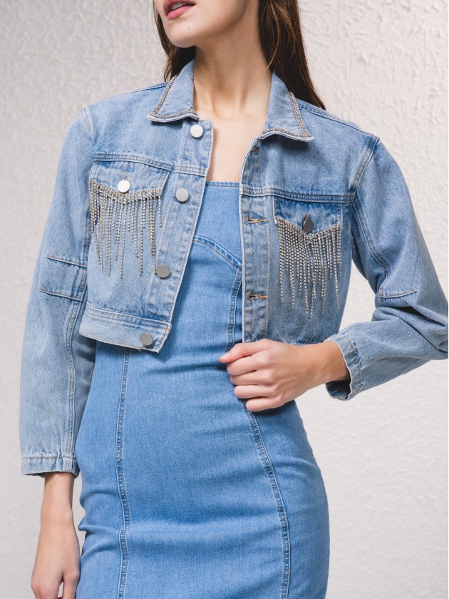 Denim jacket with applications on the pockets