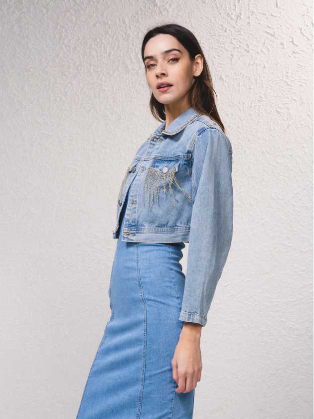 Denim jacket with applications on the pockets