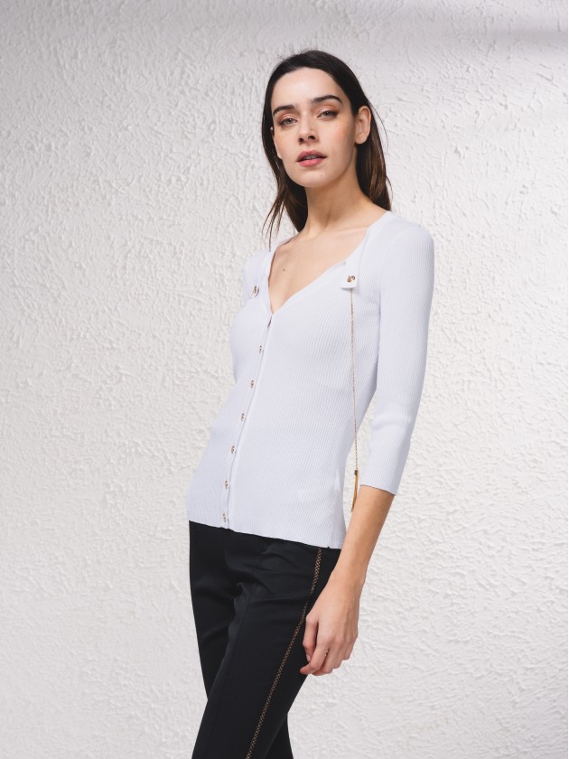 Manteau avec chanes dores