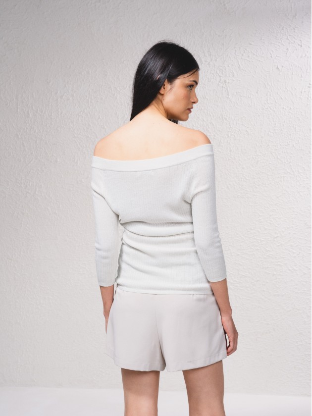 Camisola em lurex de ombros descobertos