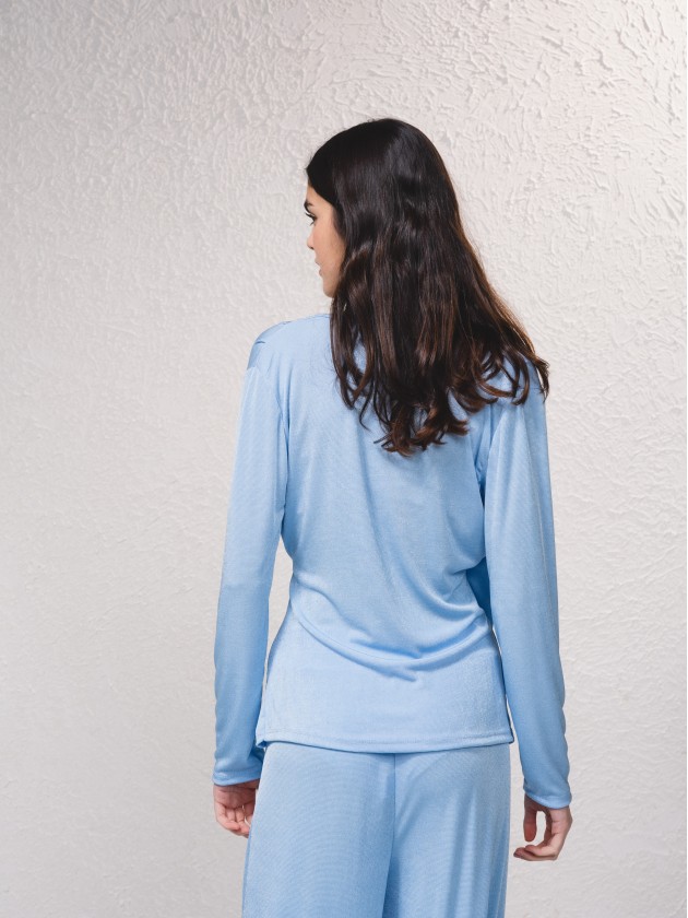 Blusa cruzada de tecido brilhante