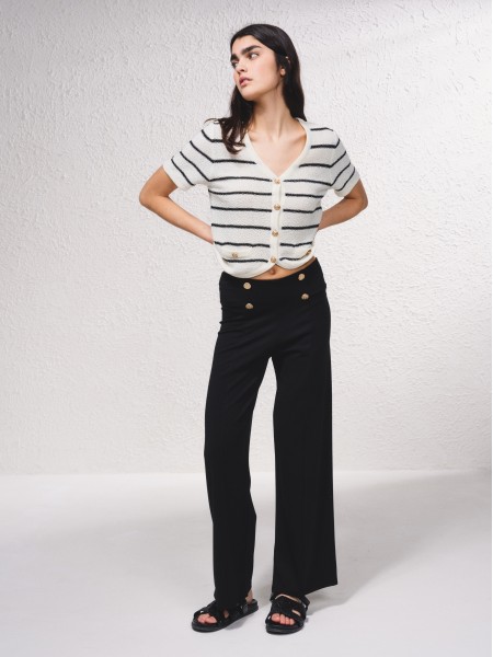 Pantalon pattes dlphant avec boutons dors