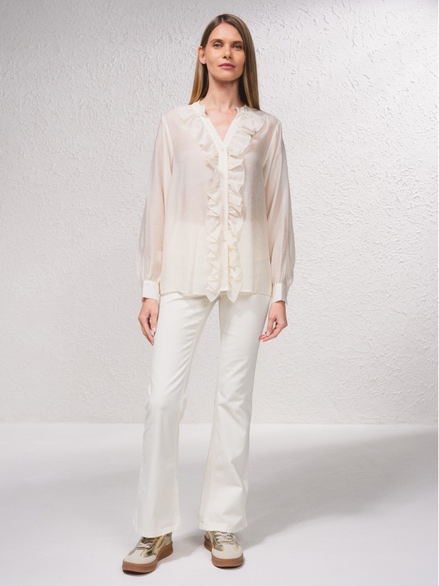 Blouse avec volants sur le devant