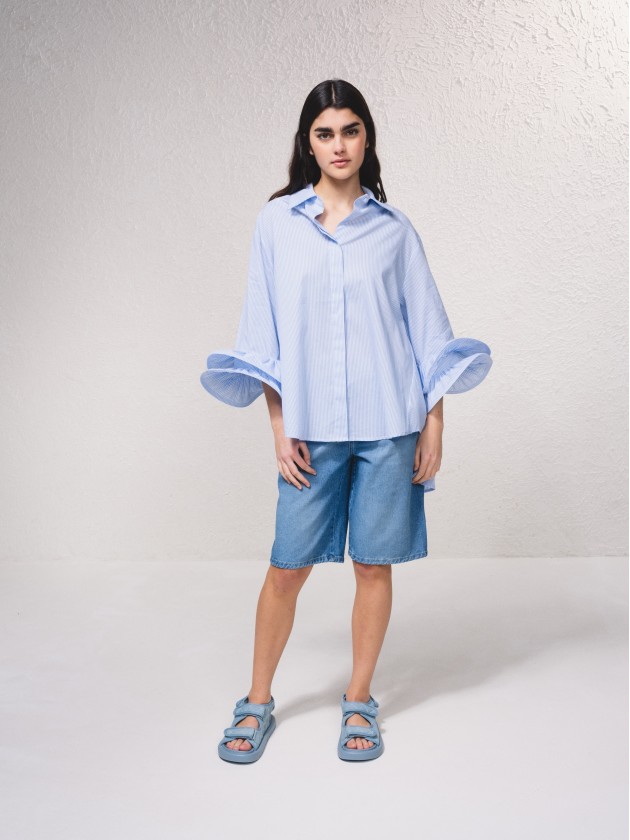 Blusa s riscas com pormenor nas mangas