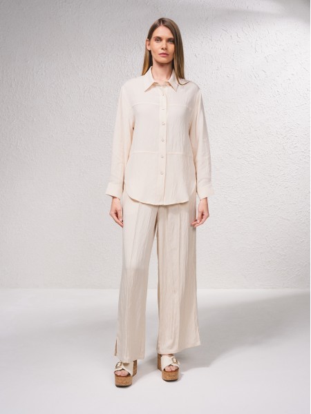 Blouse avec fermeture boutonne sur le devant