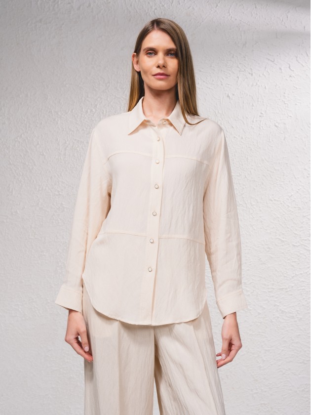 Blusa com fecho de botes  frente