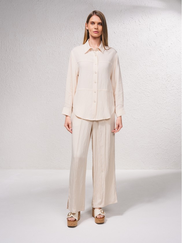 Blusa com fecho de botes  frente