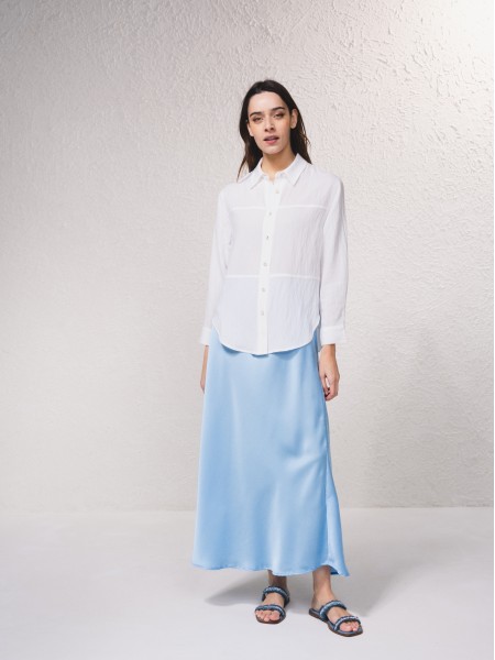 Blusa com fecho de botes  frente