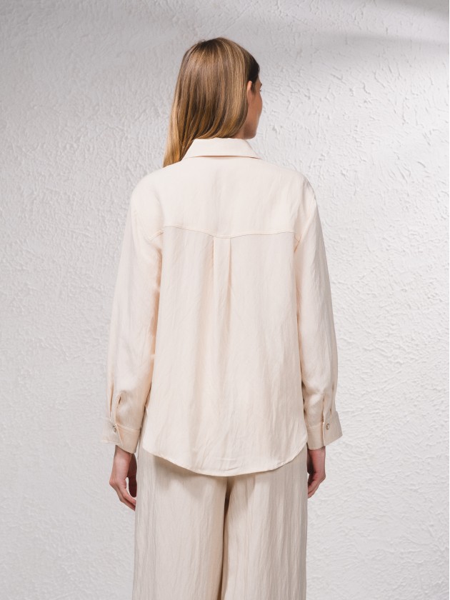 Blusa com fecho de botes  frente