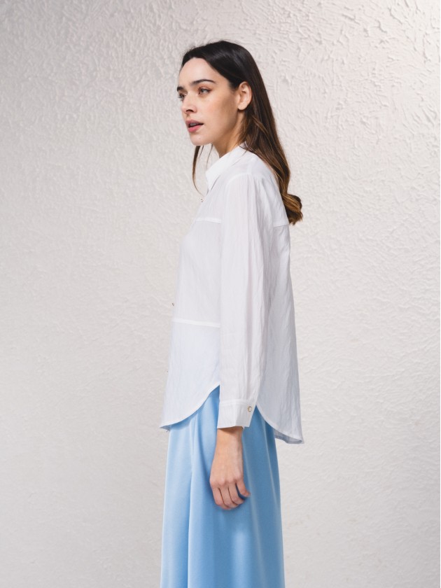 Blusa com fecho de botes  frente