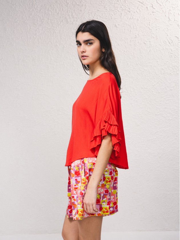 Blusa com efeito folhos nas mangas