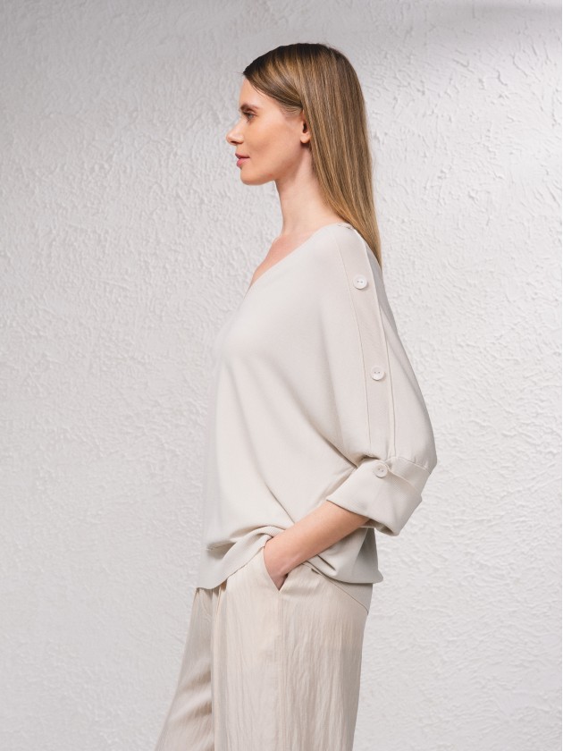 Camisola de malha com botes na manga