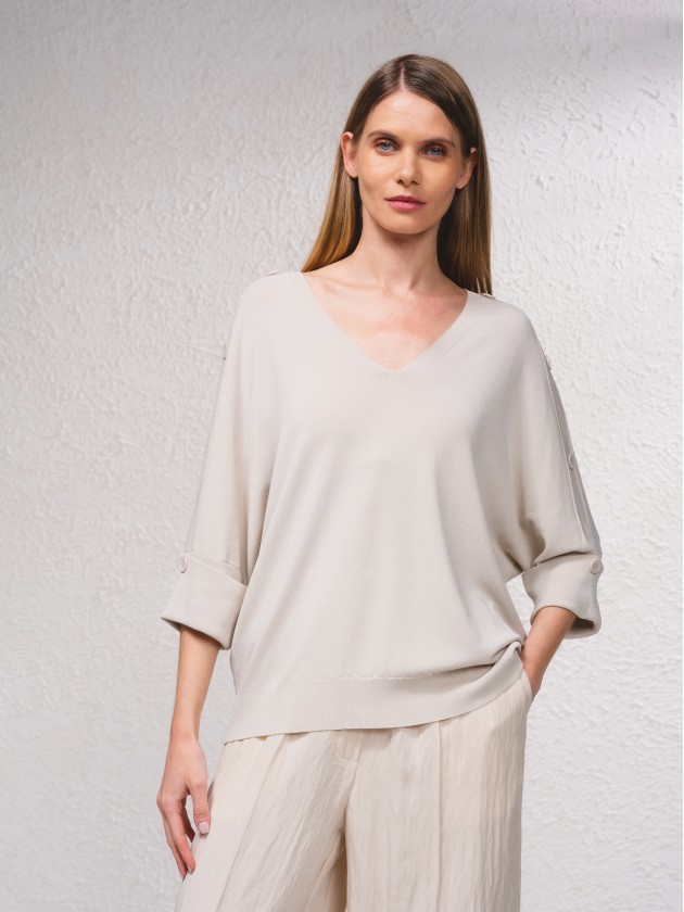 Camisola de malha com botes na manga