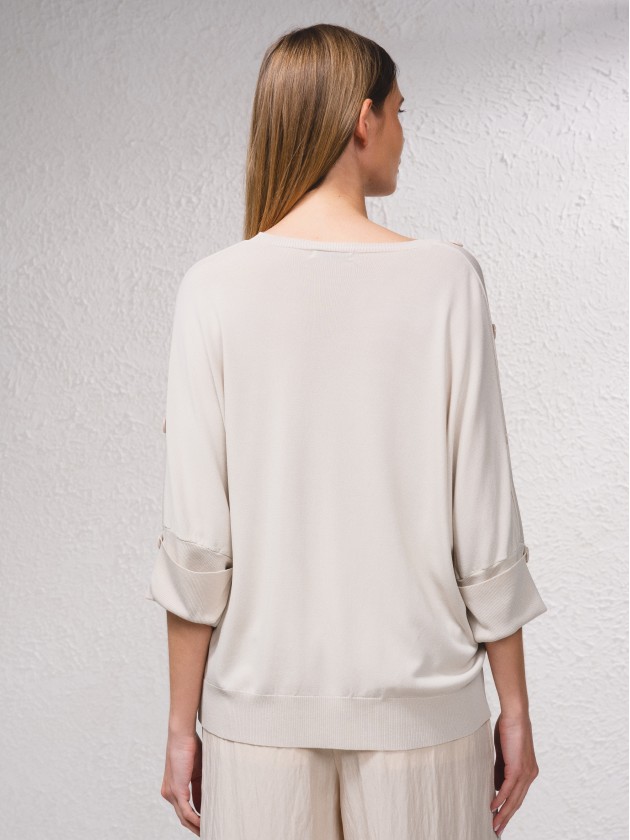 Camisola de malha com botes na manga