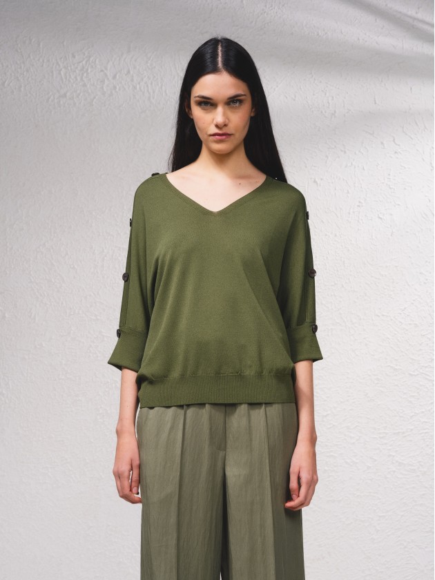 Camisola de malha com botes na manga