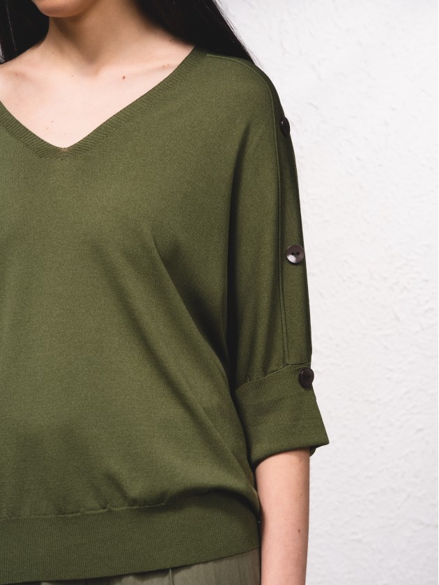 Camisola de malha com botes na manga