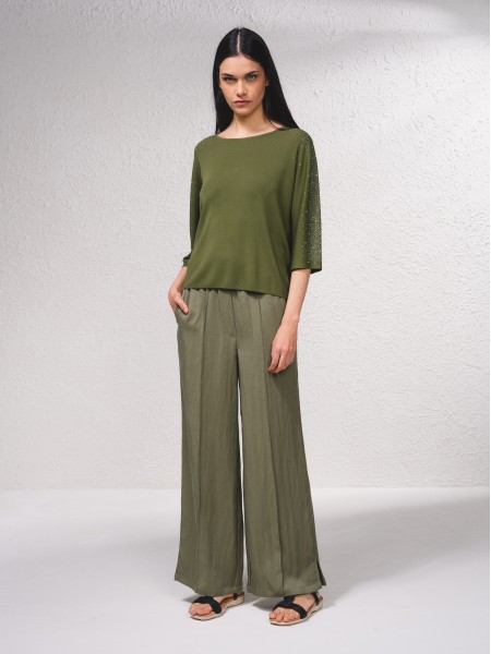 Pull avec applications brillantes