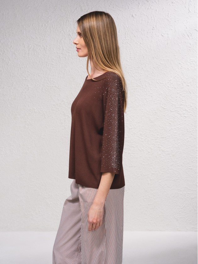 Camisola com aplicaes brilhantes