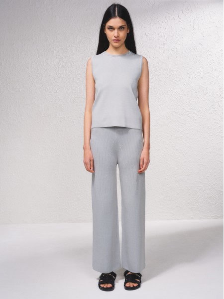 Top with shiny applications on the neckline