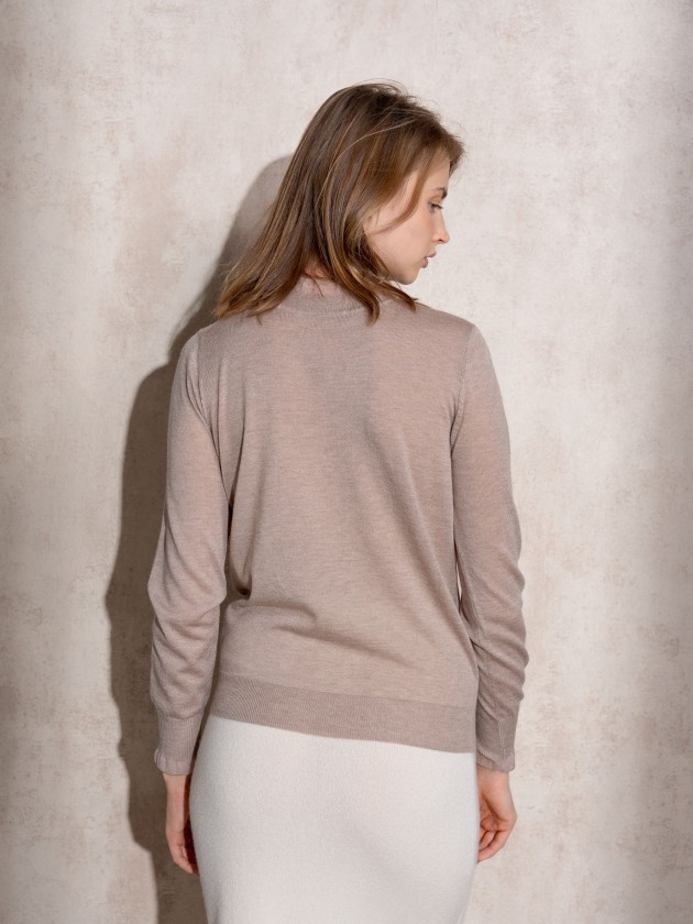 Knitted sweater with ruffles