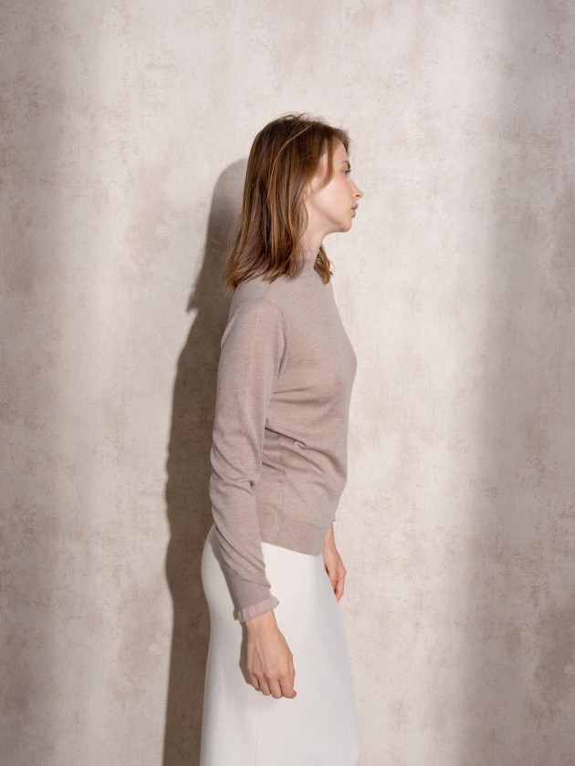 Knitted sweater with ruffles