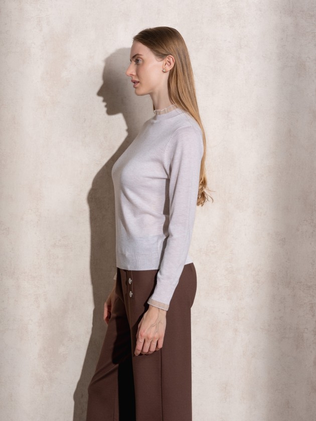 Knitted sweater with ruffles