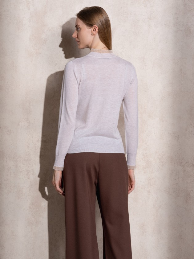 Knitted sweater with ruffles